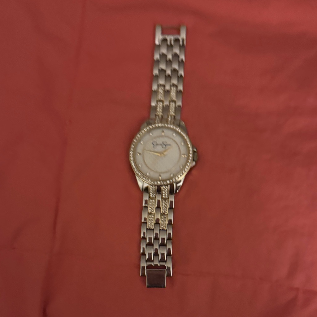 Elegant Gold Watch With Silver Accents Elegant Gold Watch With Silver Accents